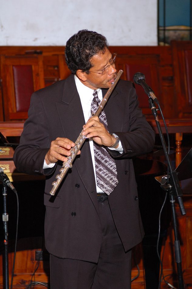 Male Playing The Flute